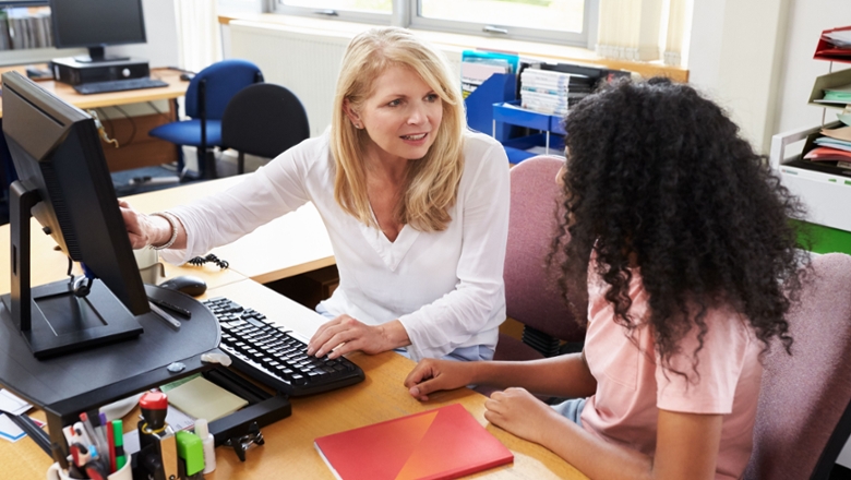 College counselor working with a student