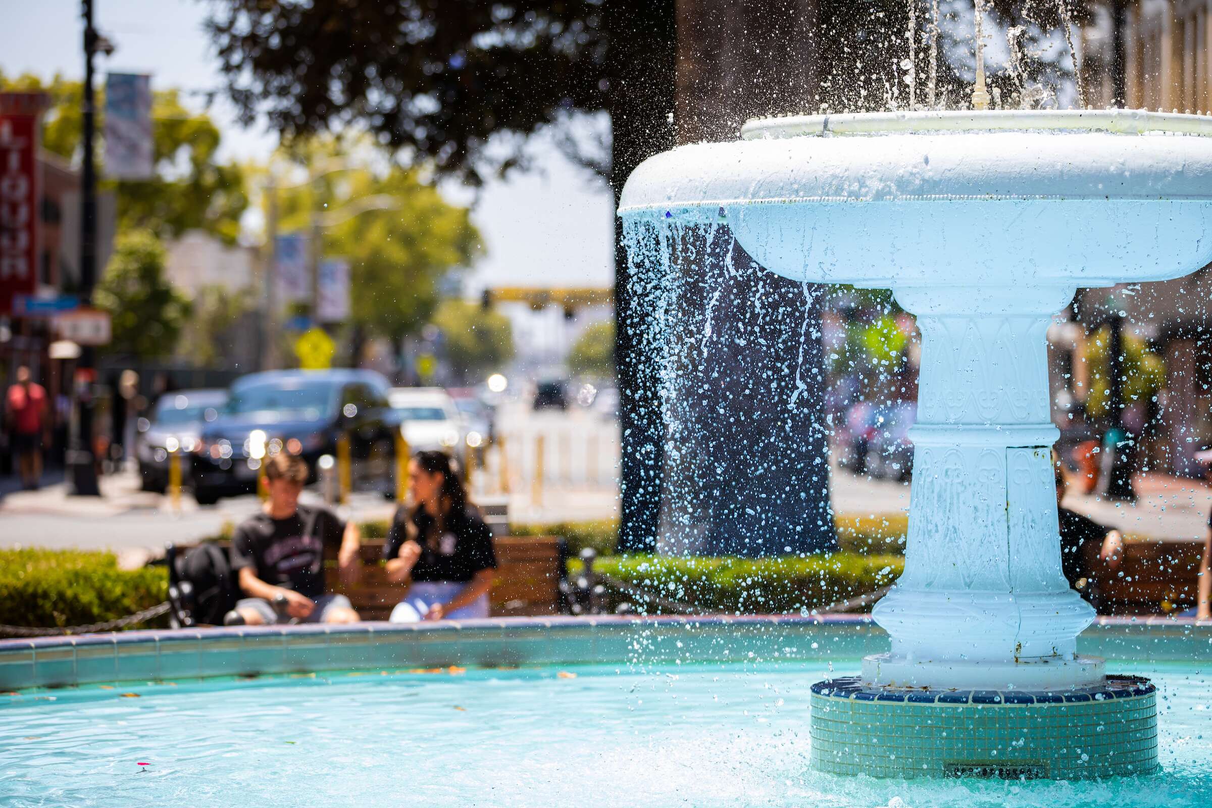 A fountain in the Orange Circle on a sunny day.
