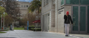 Student walking outside Chapman's Beckman Hall