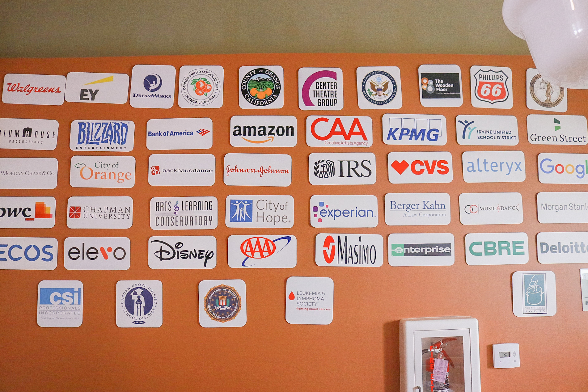 wall of company logos in career house