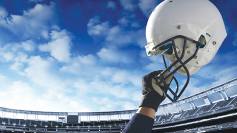 Helmet being held in the air