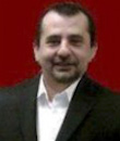 Headshot of Troy Aykan: faculty.