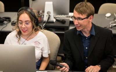 A Chapman student working with a professor
