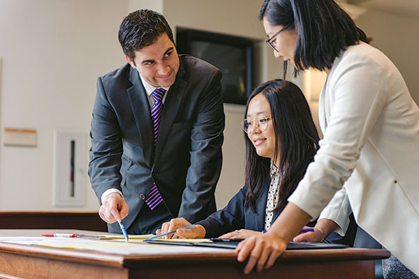 Four Chapman Law Externships student posing together