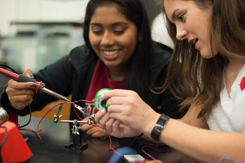 chapman engineering student working on electronics