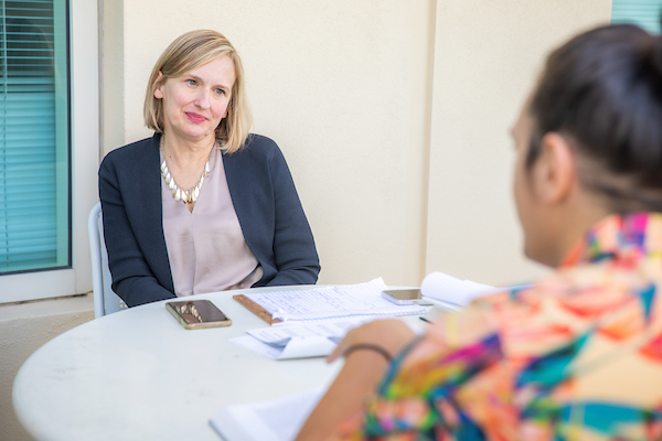 Faculty member meeting with student one-on-one
