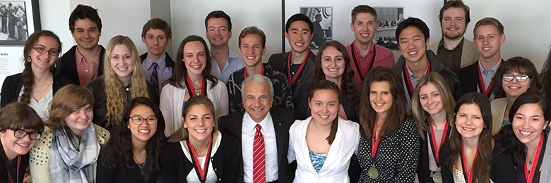 Chapman students with awards pose with President Emeritus Jim Doti.