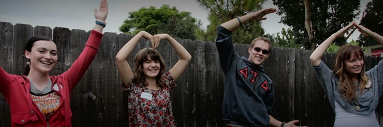 Chapman students enjoy themselves at an Honors Picnic by dancing the YMCA