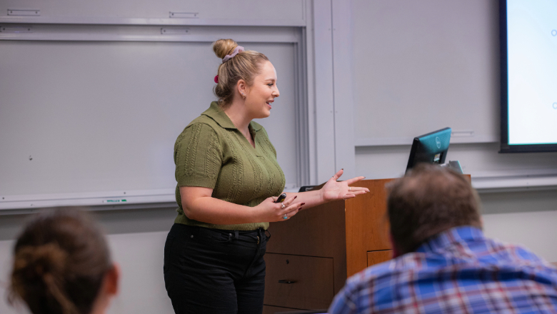 Women presents to class