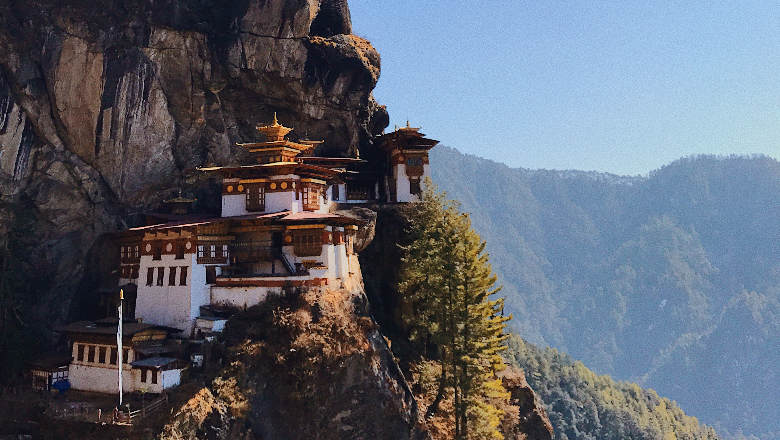 A large pagoda-like building on a mountainside.