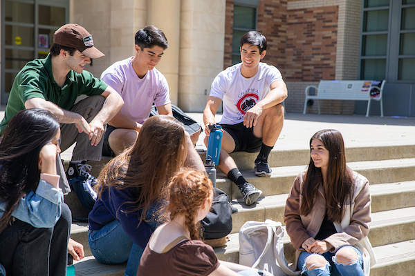 Two students working on a computer