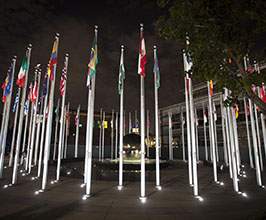 various national flags in ring of flag poles on Chapman campus