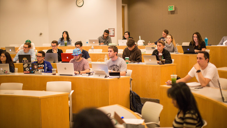 student in a business class at Chapman University