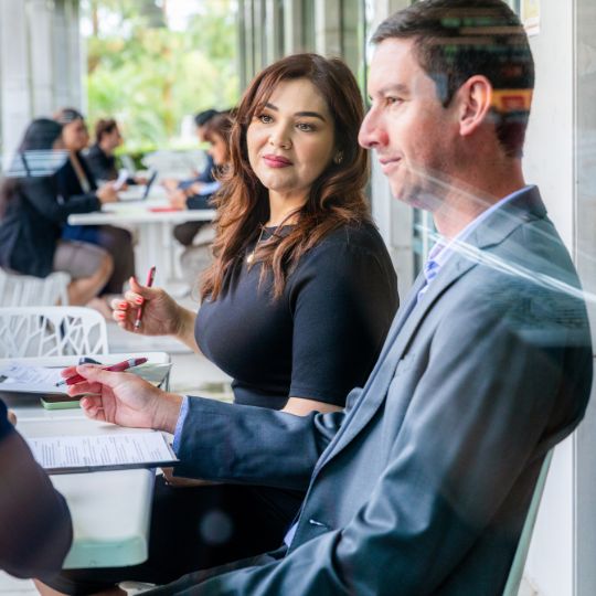 Graduate students meeting at Argyros Forum
