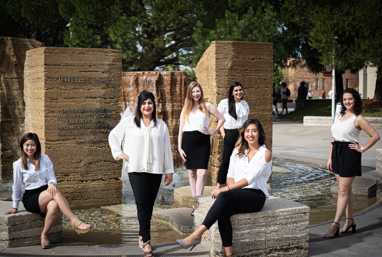 Women in Business board members standing on Chapman's campus