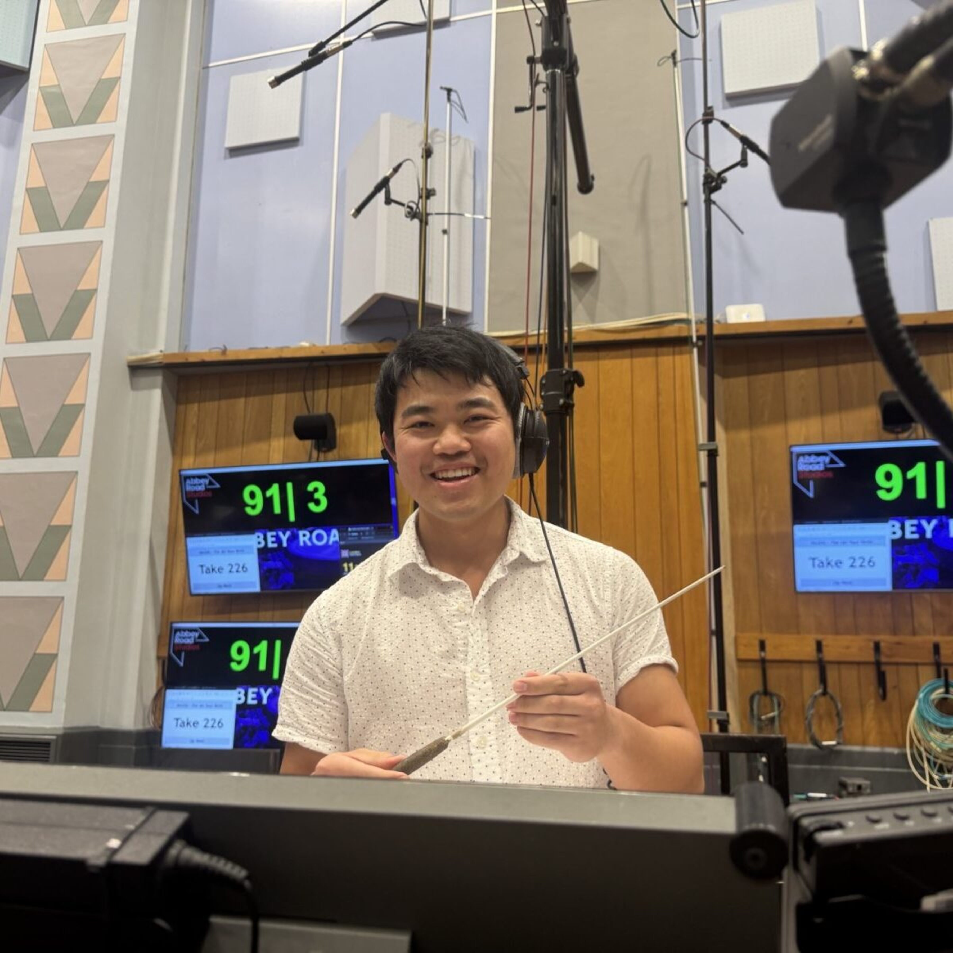 Music student Logyn Okuda orchestrating a project