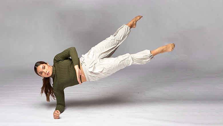 dancer in elbow hand-stand