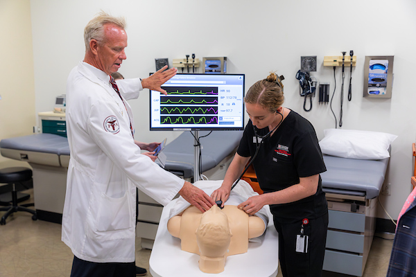 pa student and professor working in class
