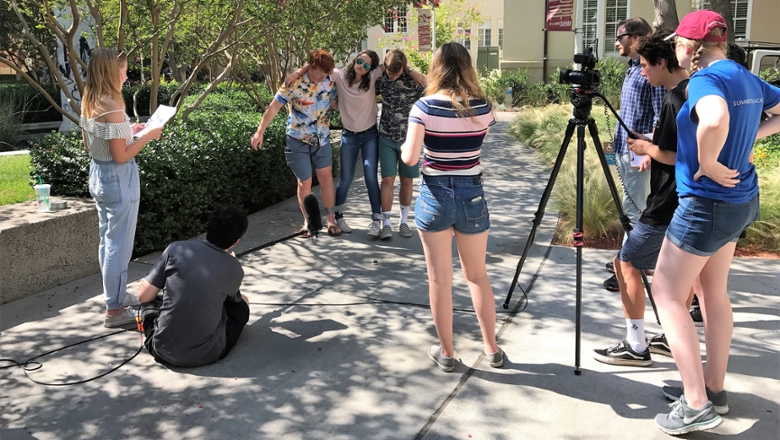 Summer Film Academy student filming on the Chapman University campus