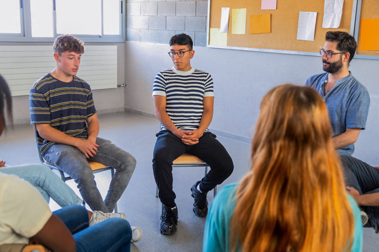Students in a group psychology setting