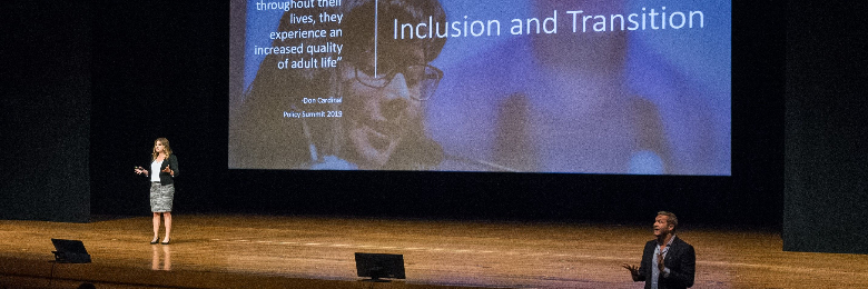 Audri Sandoval Gomez presenting on stage at the 2020 Summit on DisAbility