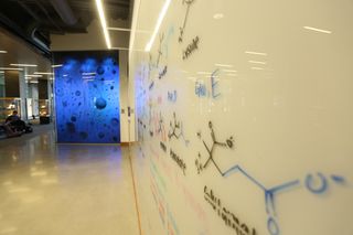 A hallway in the Keck Center with a whiteboard wall