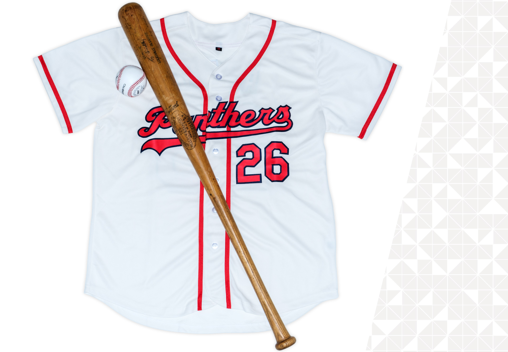 White,flatlay baseball jersey pictured with a bat and ball.