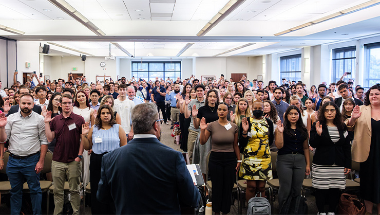 Students taking their oath of professionalism in Kennedy Hall