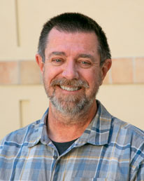 headshot photo of Dr. John Hall