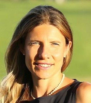Woman with black tank and pearls