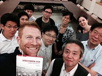 Professor Bay with his book and other scholars from Japan