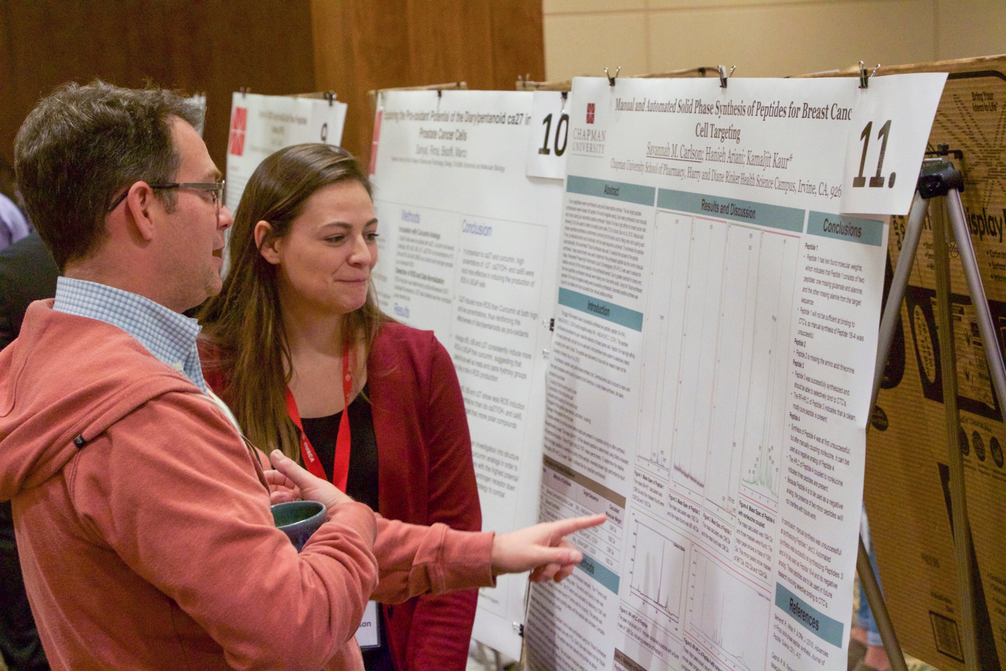 faculty and student at Chapman Student Research Day