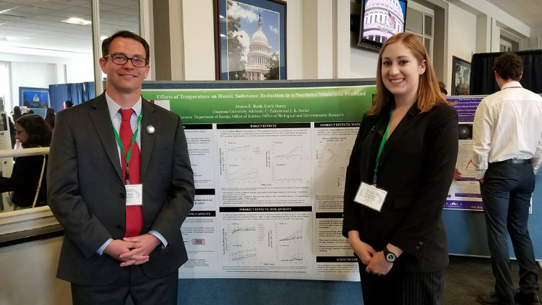 student presenting at posters on the hill