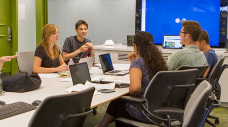 Students gathered around a table