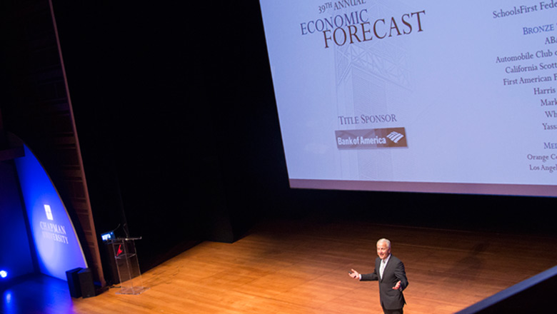 Dr. Doti on stage at the Economic Forecast