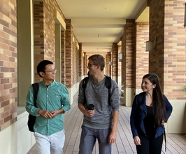 students walking down hallway in keck building