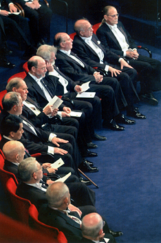 men sitting at ceremony