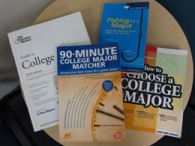Reading materials splayed on a table for choosing a major