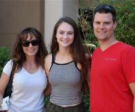 Chapman Student smiling with parents