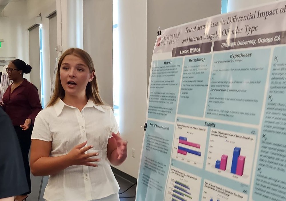 Summer 2026 participant presenting research at the concluding symposium.